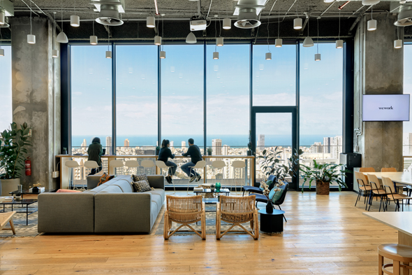 A shared WeWork office space in Tel Aviv. Photo: Udi Idan A shared WeWork office space in Tel Aviv. Photo: Udi Idan